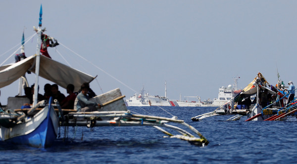 ▲中國從去年10月開始，允許菲律賓漁船在黃岩島捕魚。（圖／路透社）