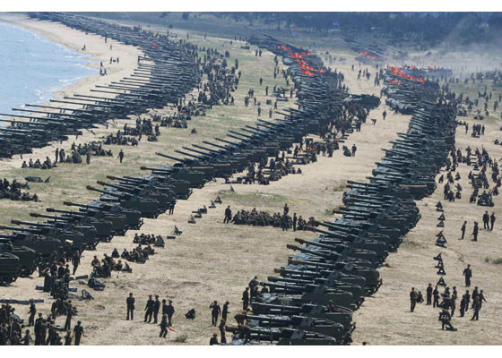 北韓舉行大規模火炮射擊軍演。（圖／翻攝自《勞動新聞》）