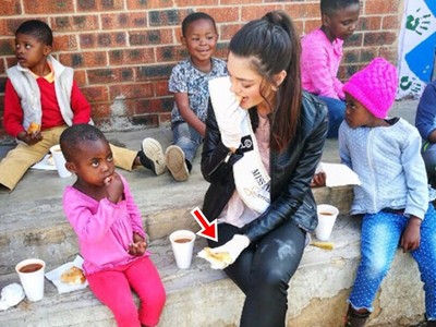 戴手套發食物給愛滋病童　鄉民嗆南非小姐「歧視」反被圍剿