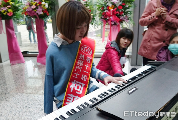 獨臂少女柯菲比。(圖/記者嚴云岑攝)