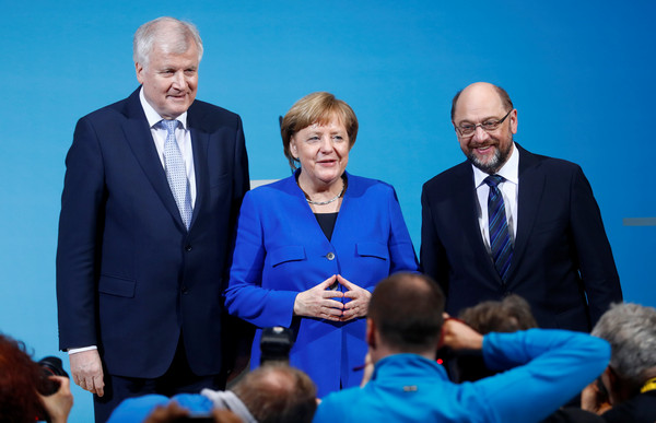 ▲▼ 德國總理（Angela Merkel）籌組內閣談判，經過超過24小時的馬拉松式會談後，達成初步共識向共組政府邁進一大步，也保住自己的4連霸總理之位。（圖／路透社）