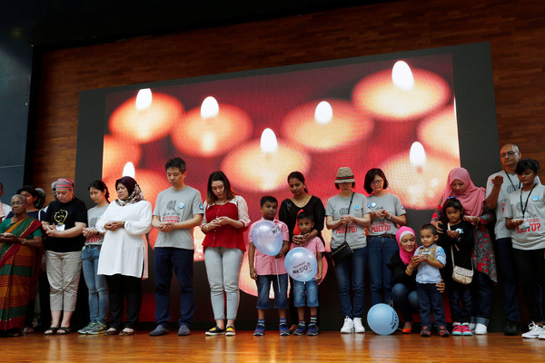 ▲▼ 馬來西亞民眾出席馬航MH370四周年追思紀念活動。（圖／路透社）