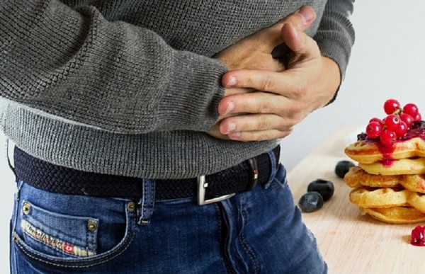 ▲▼胃痛,肚子痛。(圖/外稿提供)