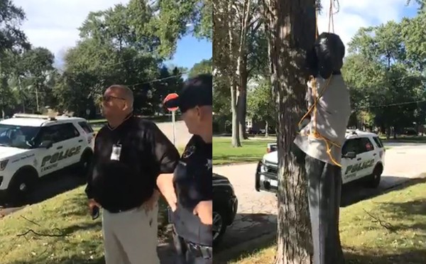 ▲▼美國伊利諾州一處社區出現驚人的萬聖節裝飾,當地15歲的少女正在與母親格里芬(Griffin)講電話,卻看見黑色的假人雙手、腳踝都被綁住,吊在人行道旁邊的樹上。(圖/翻攝自臉書/Will Ruth III)