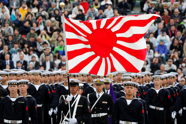 ▲▼ 「旭日旗」被視為日本侵略及軍國主義的象徵           。（圖／路透）