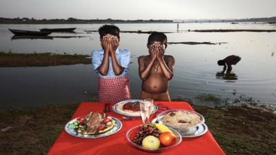 看得到吃不到！　攝影師刻意在印度難民前擺美食　照片引發廣大反彈
