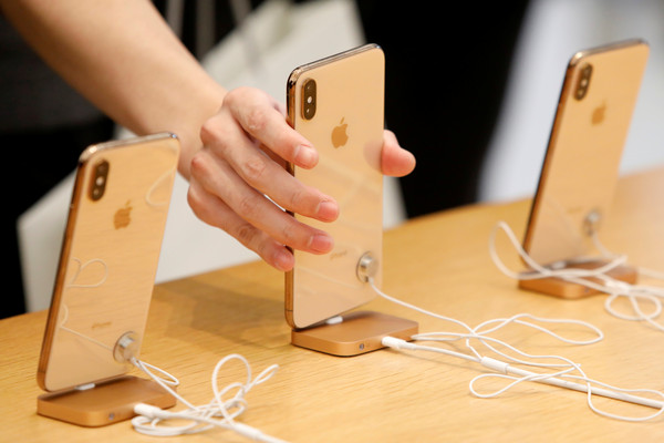 ▲市場分析師認為，這次蘋果推出新iPhone將帶動強大的換機潮。（圖／路透）