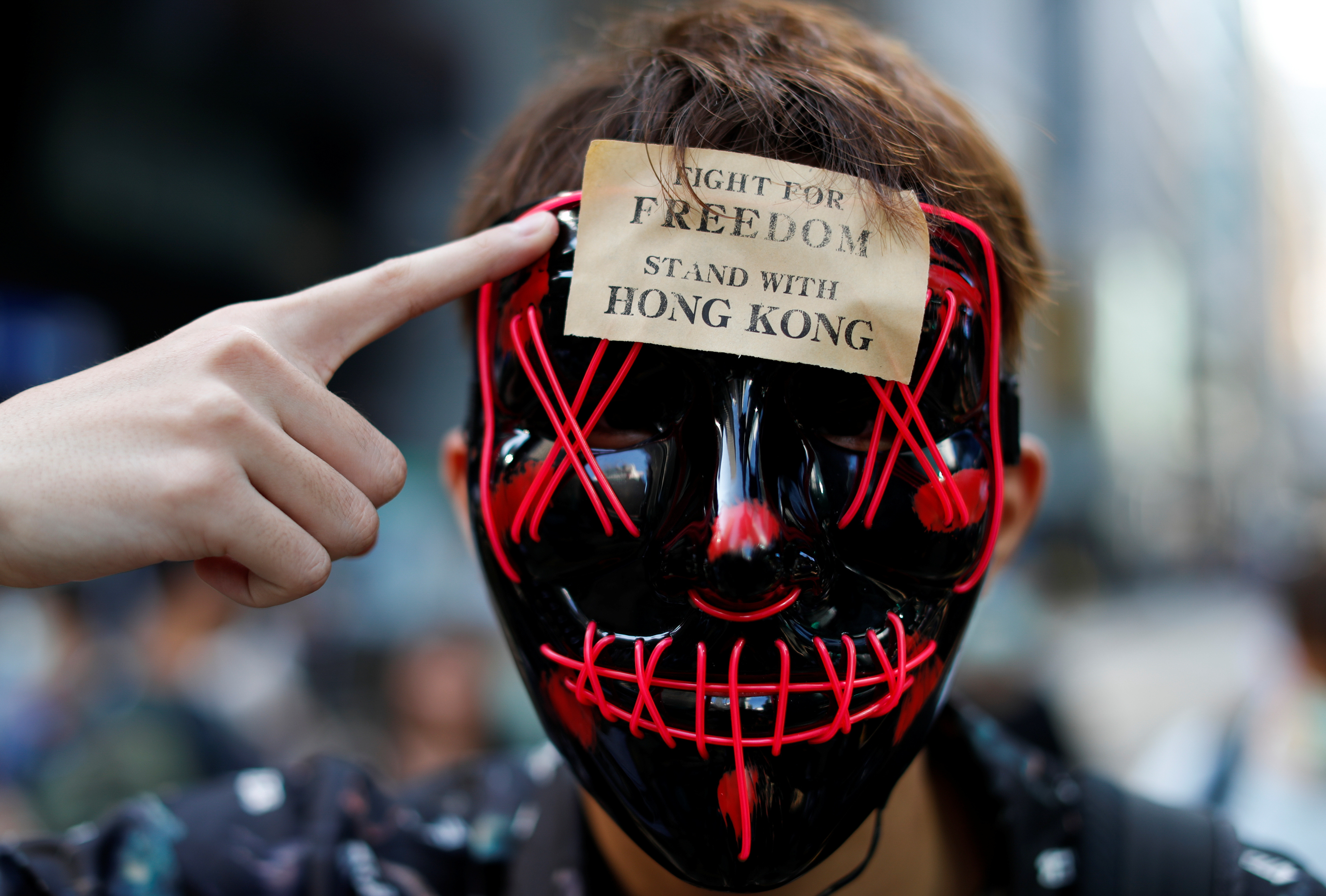 ▲▼香港政府祭出禁止蒙面法規,香港反送中,禁蒙面法。（圖／路透）