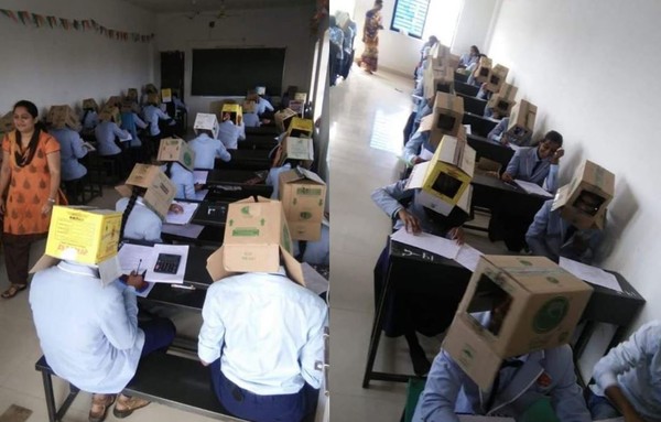 ▲▼印度學生考試時戴上紙箱，防止作弊。（圖翻攝自推特／ANI）
