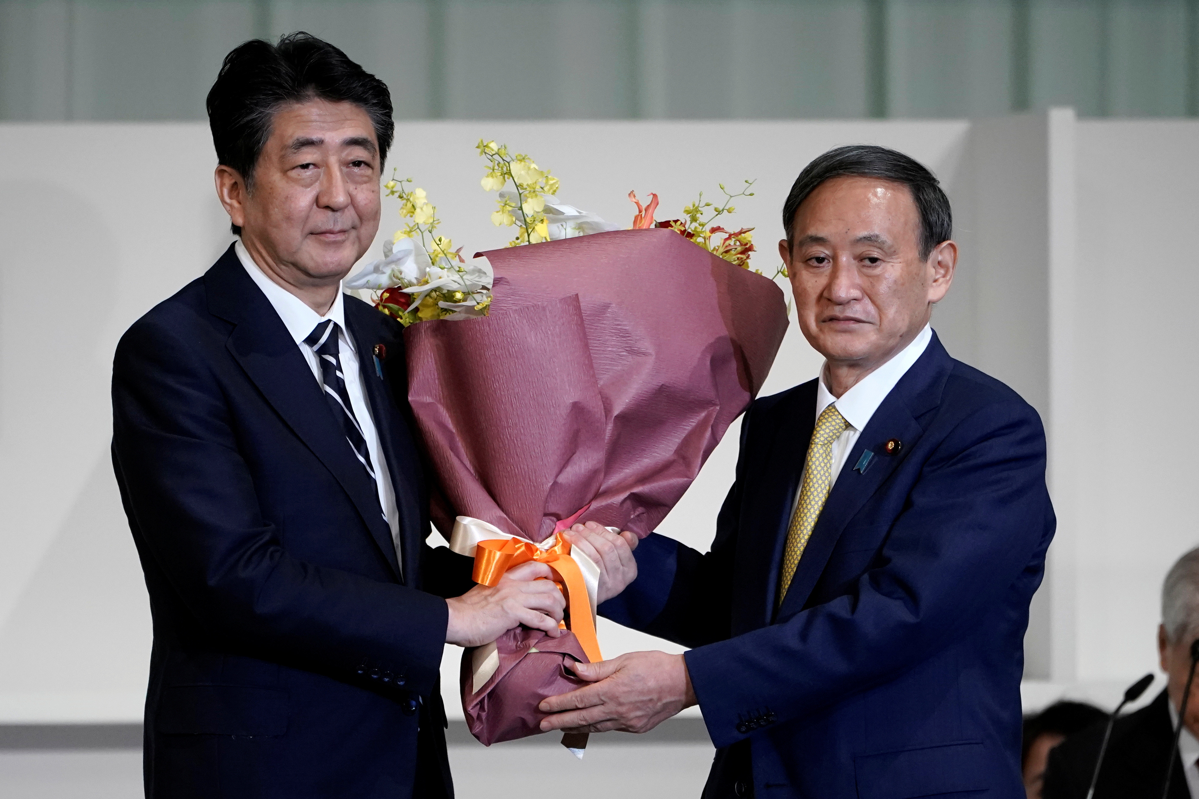 ▲▼菅義偉、安倍晉三,新任自民黨黨魁。（圖／路透）