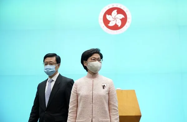 ▲▼李家超,林鄭月娥。(圖/路透社)