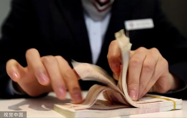 ▲點鈔,數鈔票。(圖/CFP)