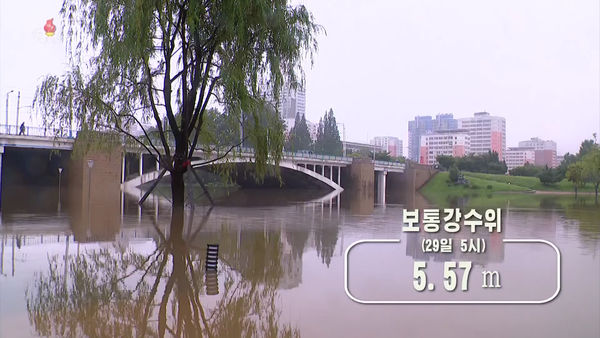 ▲▼北韓平壤6月底降下豪雨，普通江水位高達5.57公尺。（圖／達志影像）