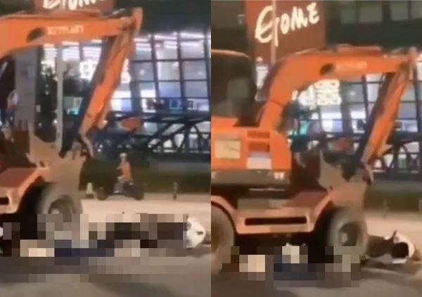 ▲▼怪手闖紅燈撞趴女騎士 「誤判情況」倒車再把她輾死。(圖/翻攝自微博)