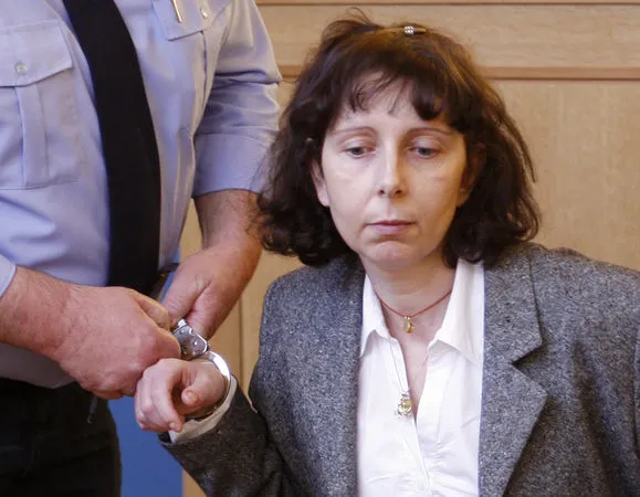 ▲▼比利時婦女薛米特(Genevieve Lhermitte)2007年趁丈夫穆卡德姆(Bouchaib Moqadem)返鄉,持菜刀「割喉」殺害5名親生骨肉。(圖/達志影像/美聯社)