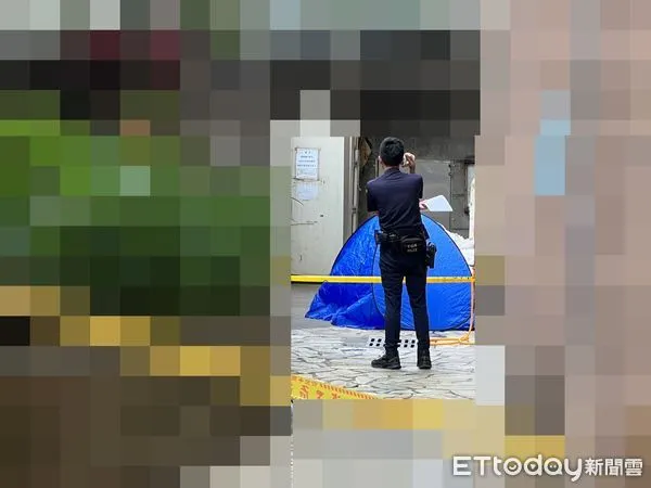 ▲(打碼)新北市新莊區一名女子不明原因墜樓,身體攔腰分離明顯死亡。(圖/記者陳以昇攝)