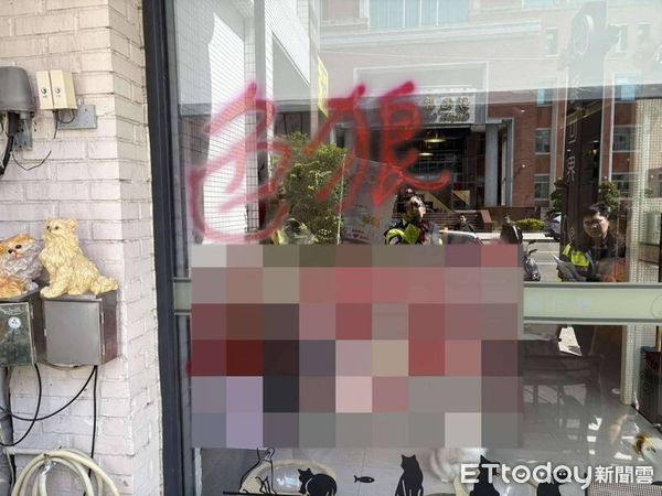 ▲彰化寵物餐廳遭噴上紅漆。(圖/警方提供)