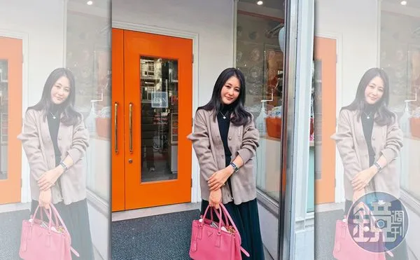 麻衣現身東京六本木的街頭,她手拿要價新台幣15萬元的PRADA包,住在有燙金門牌的港區地段。