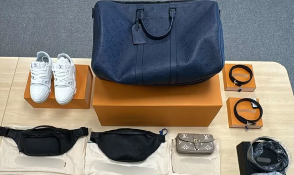 ▲▼兩名台灣男子在新加坡盜刷卡買名牌遭逮。(圖/新加坡警察部隊)