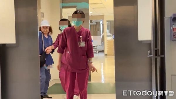 ▲▼三峽3死車禍,亞東醫院外科加護病房警方派員駐守,余妻見到媒體立即閃躲。(圖/記者黃彥傑翻攝)