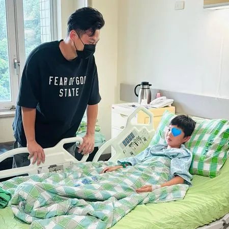 ▲戴培峰探視因界外球受傷的小球迷。(圖/富邦悍將提供)