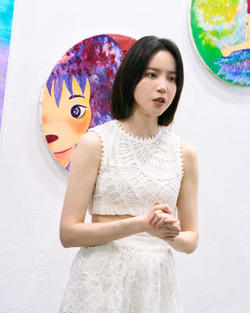 ▲程予希台北簽書會與粉絲一起過生日,期待有天到海外辦展。(圖/星星相藝提供)