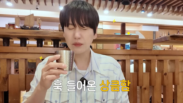 ▲圭賢首次嚐到蘋果西打。(圖/翻攝自圭賢YT)