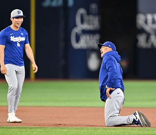 ▲金慧成與羅伯斯賽跑。(圖/達志影像/美聯社)