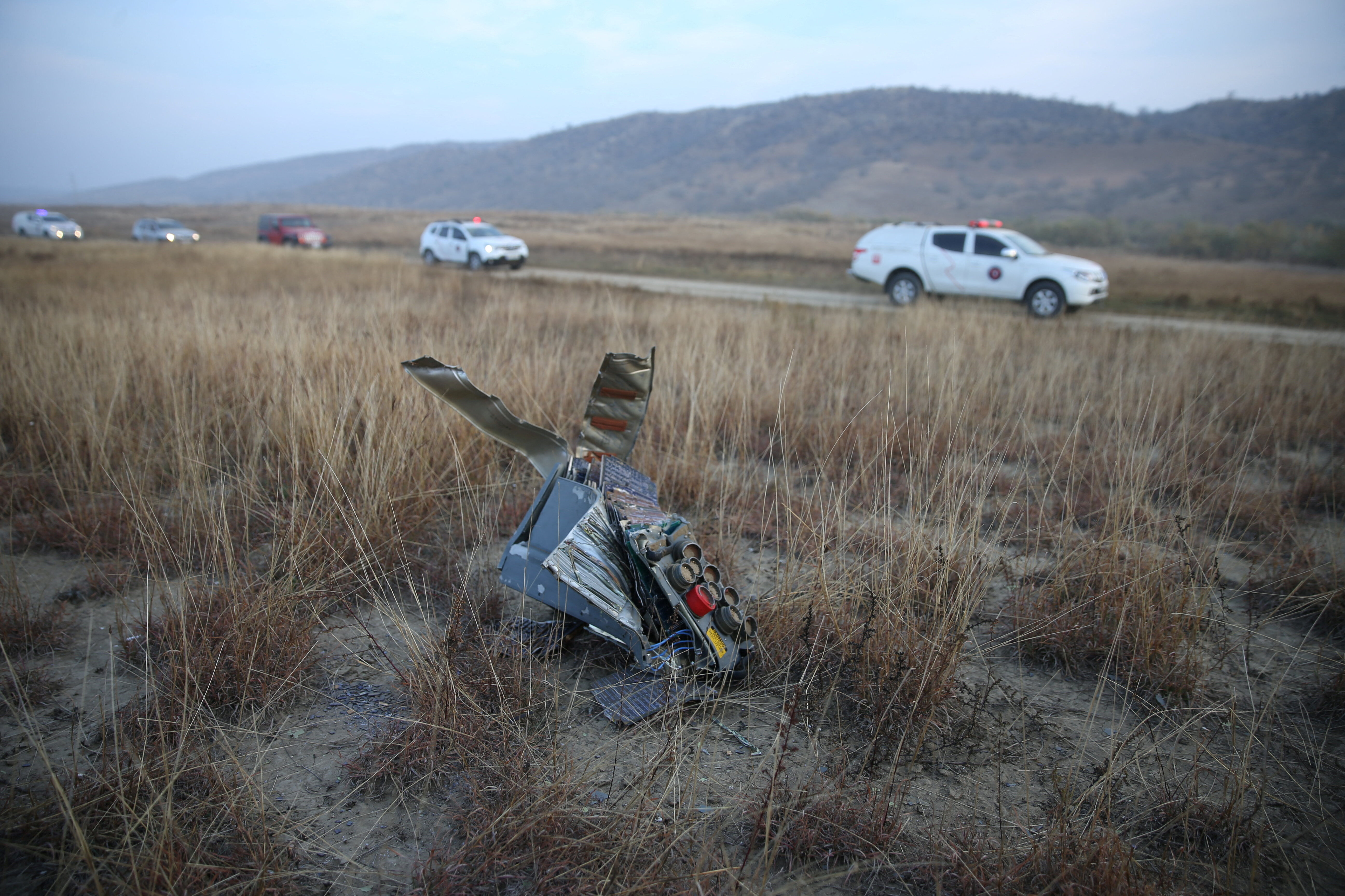 ▲▼土耳其一架C-130軍用運輸機在喬治亞境內墜毀,現場可見機體殘骸。(圖/路透)
