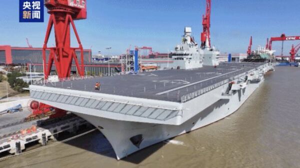 ▲大陸首艘076兩棲攻擊艦(四川艦)出港海試。(圖/翻攝央視)