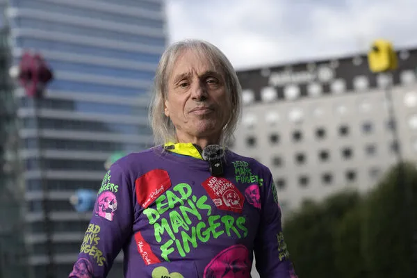 ▲法國「蜘蛛人」亞倫羅伯特(Alain Robert)。(圖/達志影像/美聯社)