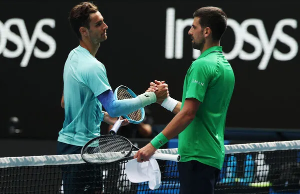 ▲穆塞蒂因傷退賽,喬科維奇晉級4強。(圖/路透)