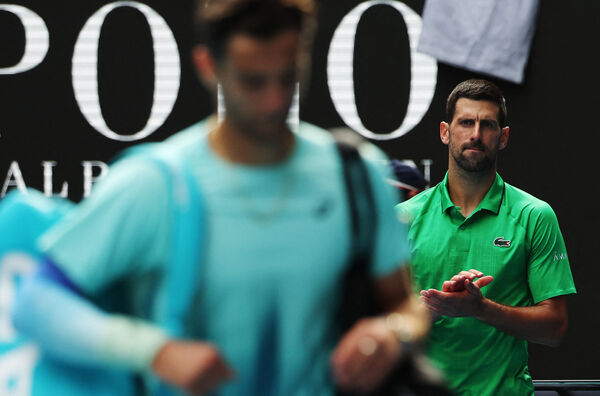 ▲穆塞蒂因傷退賽,喬科維奇晉級4強。(圖/路透)