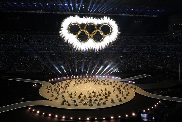 ▲米蘭冬奧正式開幕,中華隊林欣蓉、李宇翔擔任掌旗官。(圖/中華奧會提供)