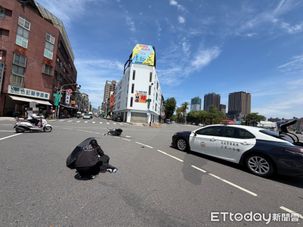 ▲▼員警趕著處理車禍撞傷騎士。(圖/記者許宥孺翻攝)