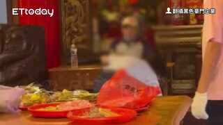大甲鎮瀾宮激動女狂丟瓶裝水！香客嚇壞報警　廟方不追究
