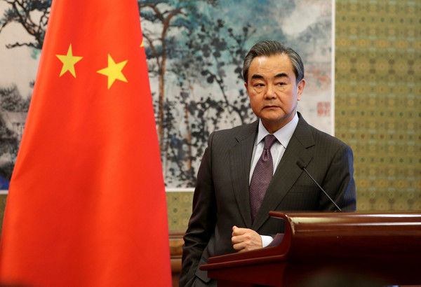 中國大陸外交部長王毅參加在釣魚台國賓館的會議。（圖／路透社）