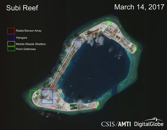 大陸南沙人造島渚碧礁(Subi Reef)，圖中顯示雷達、機庫等各項軍事設施。（圖／翻攝自亞洲海事透明倡議官網）
