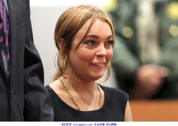 琳賽蘿涵(Lindsay Lohan)腫臉出庭。(圖／達志影像)