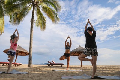 Club Med三亞度假村的美麗海灘，是Unn做日出瑜珈的最佳場所。