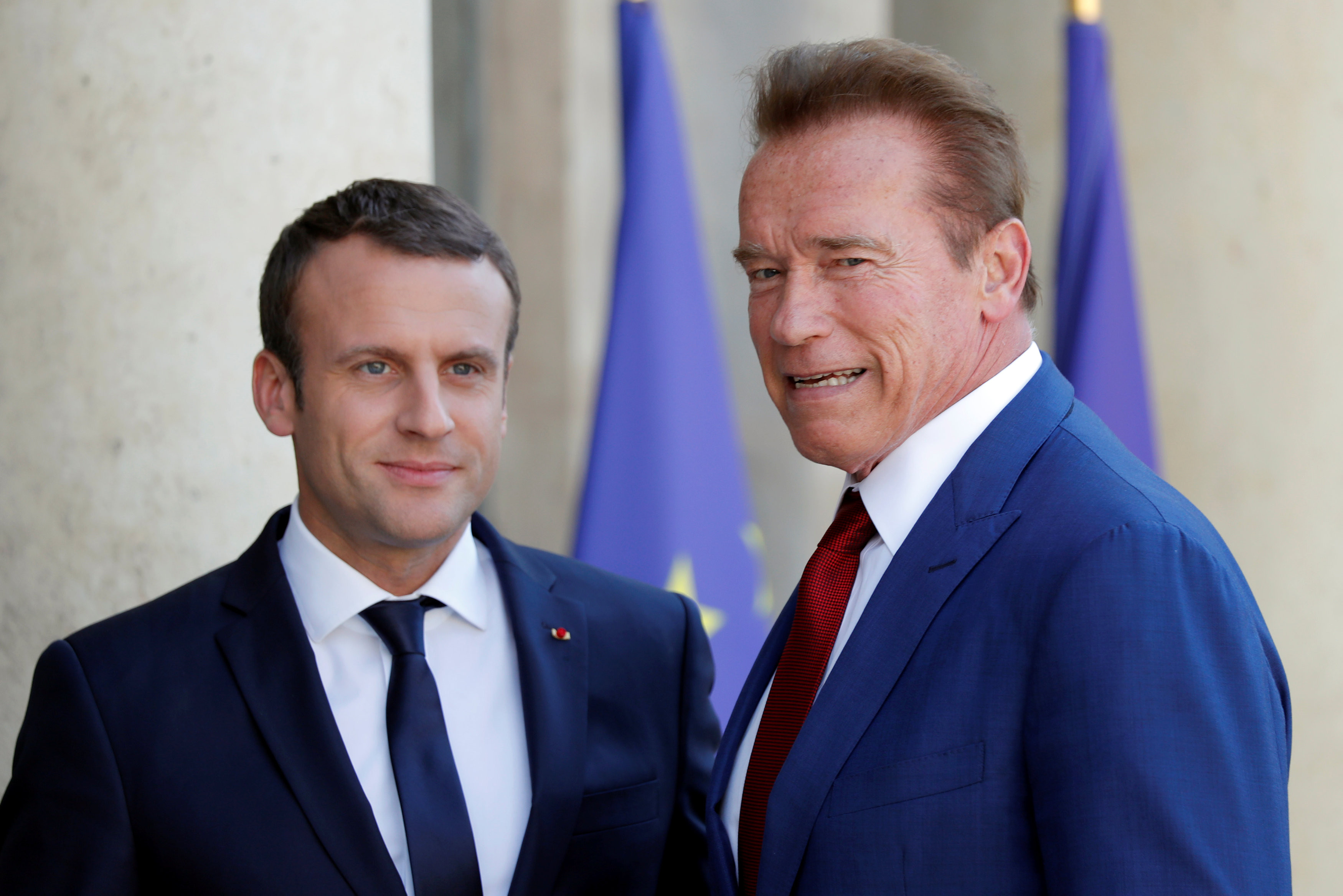 ▲阿諾史瓦辛格（Arnold Schwarzenegger）與馬克宏（Emmanuel Macron）會面。（圖／路透社）