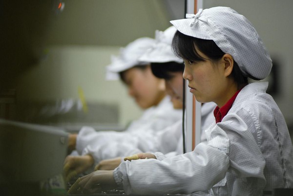 黑市以重金向蘋果中國代工廠員工招手，換取蘋果新產品的零件。(東方IC)