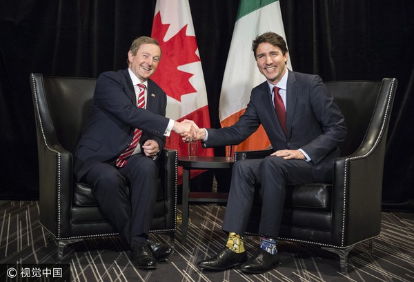 ▲▼襪子外交引熱議，男神加拿大總理杜魯多（Justin Trudeau）有雙不甘平庸的腳。（圖／CFP）