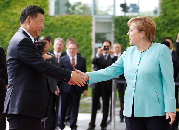 ▲習近平5日展開在德國的正式訪問，並與德國總理梅克爾（Angela Merkel）舉行雙邊會談。（圖／路透社）