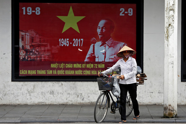 ▲▼越南共產黨、越南民主共和國領導人胡志明，越南與中國國旗。（圖／路透社）