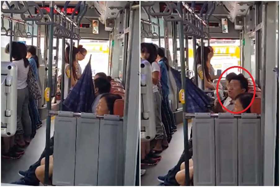 ▲一名男子用雨傘遮住自己的臉，怒罵公車上的女學生和婦人不該坐博愛座。（圖／翻攝自爆料公社）