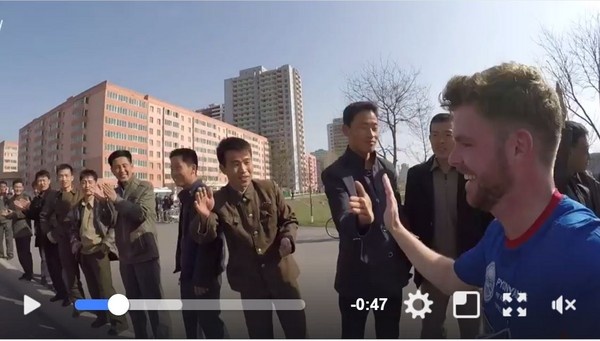 ▲▼愛爾蘭跑手與北韓民眾熱情high five。（圖／翻攝自Faraway Martin粉絲專頁）