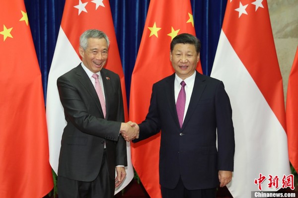 ▲▼2017年9月19日，新加坡總理李顯龍對中國進行正式訪問，並在北京人民大會堂會晤習近平。（圖／翻攝自中新網）