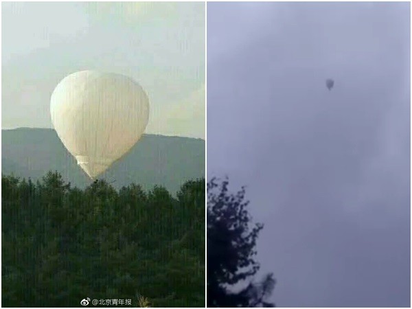 ▲▼搭氫氣球採松子...風一吹他就飄走了　失聯4天消失迷霧中。（圖／翻攝自北京青年報）