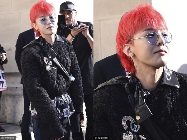 GD即將於10月7、8日在台北南港展覽館開唱，身為時尚指標的他日前受邀前往巴黎時裝周，一頭紅髮出場即成為全場焦點。